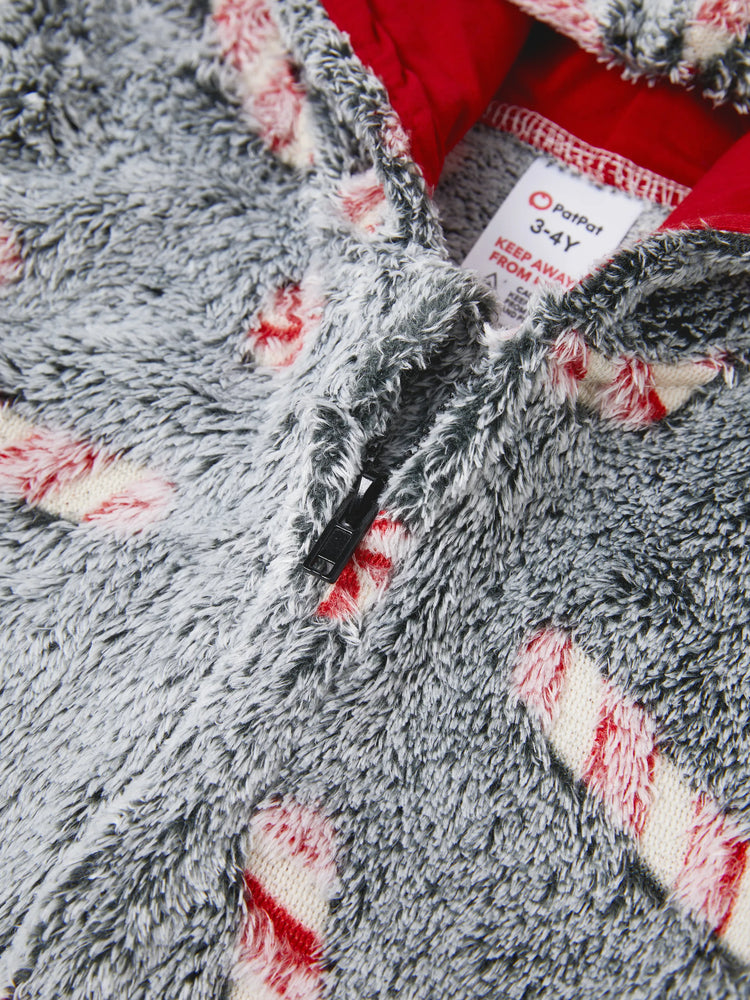 Pyjama grenouillère assorti aux tenues de Noël, motif canne à sucre (brille dans le noir) avec chaussettes de Noël noires