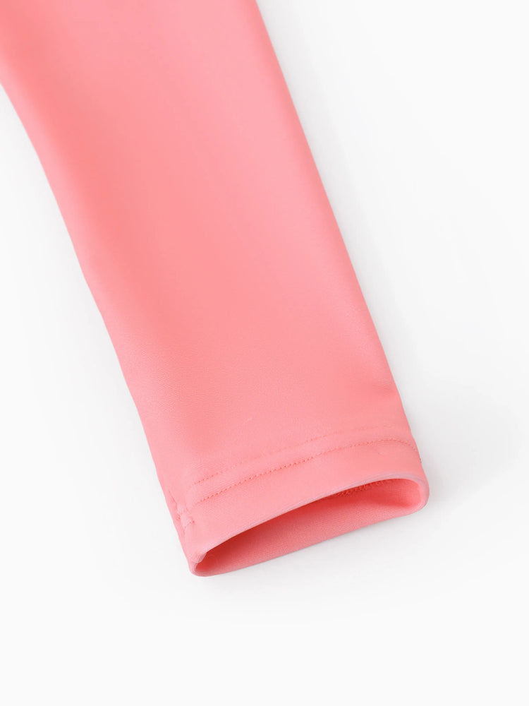 Traje de baño de manga larga con volantes y cremallera en bloques de color rosa oscuro de la princesa Disney Ariel para niña pequeña. Protección solar UPF 40+.