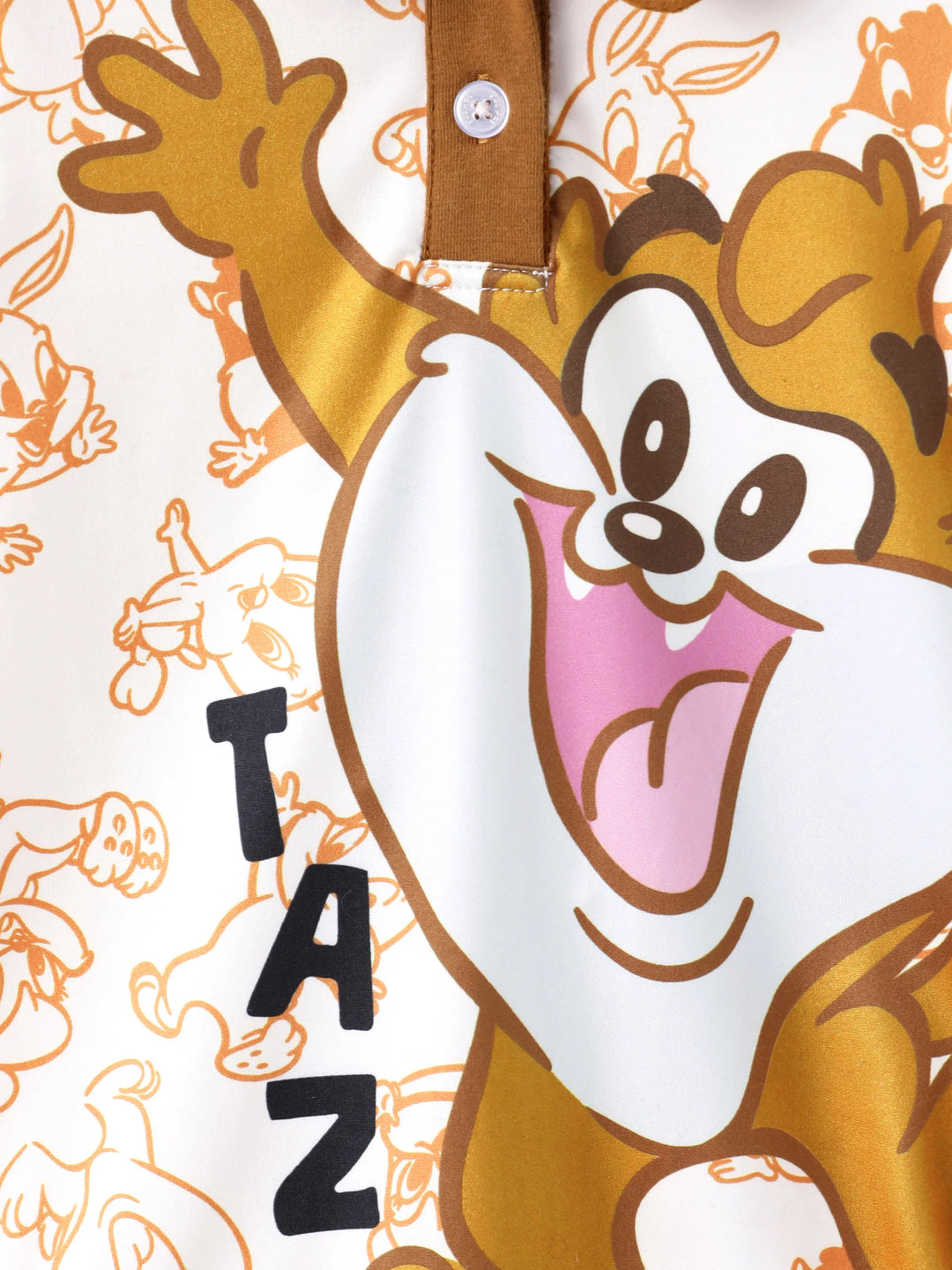 Combinaison Looney Tunes pour bébé garçon, marron, à imprimé coutures et col polo colorblock.