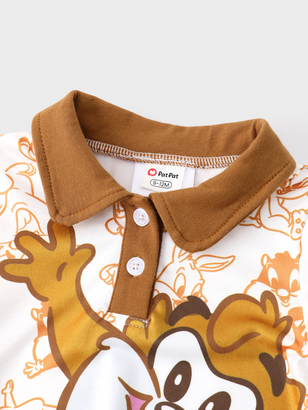 Combinaison Looney Tunes pour bébé garçon, marron, à imprimé coutures et col polo colorblock.