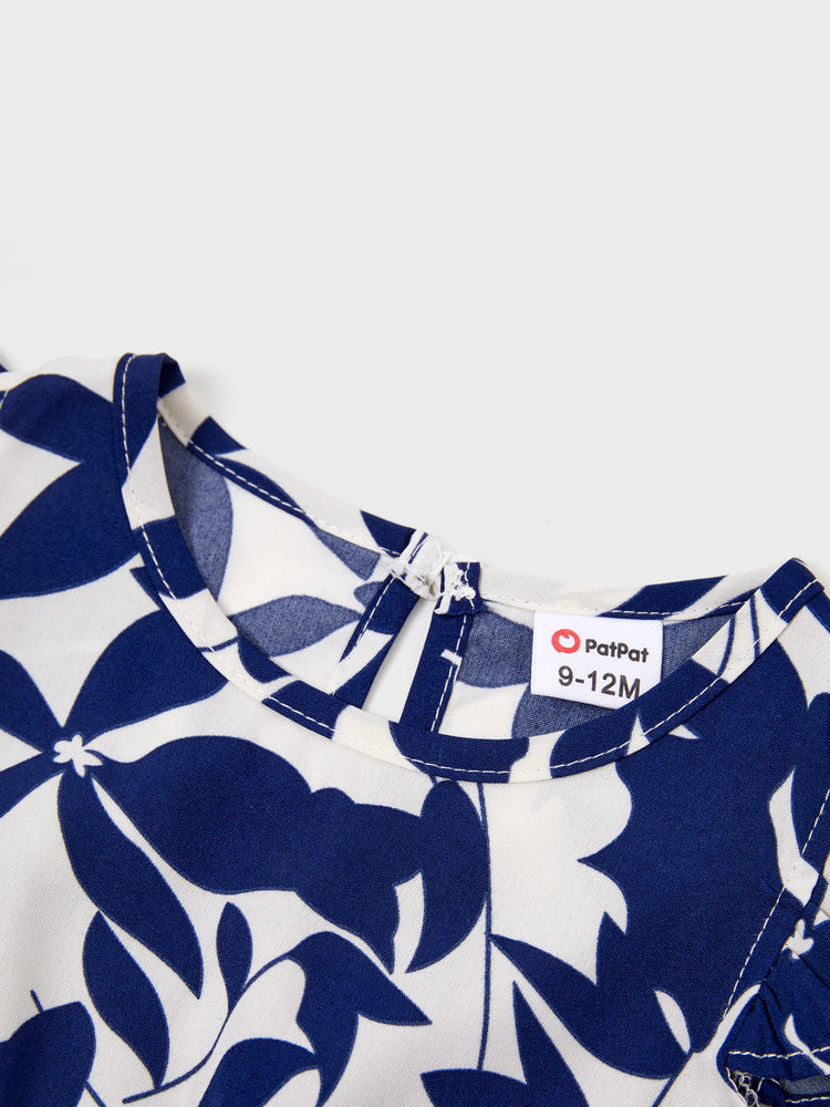 Ensemble familial assorti avec t-shirt bleu à blocs de couleurs ou robe à manches bouffantes et smocks à imprimé feuilles