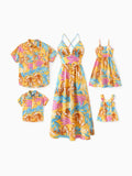 Ensemble familial assorti jaune à imprimé feuilles tropicales, chemise à manches courtes ou robe à bretelles jaune