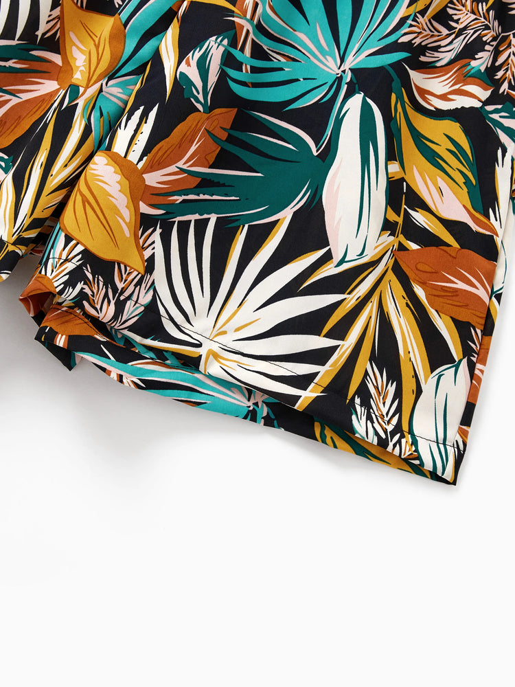 Conjunto familiar a juego para mamá y yo: pantalones cortos con estampado de hojas tropicales y top halter cruzado en negro