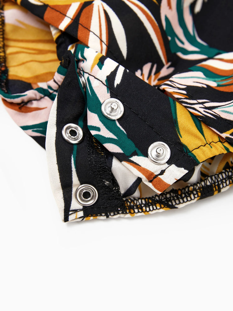 Conjunto familiar a juego para mamá y yo: pantalones cortos con estampado de hojas tropicales y top halter cruzado en negro