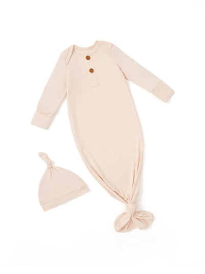 Bamboo infant sleeping gown with matching hat, apricot.
