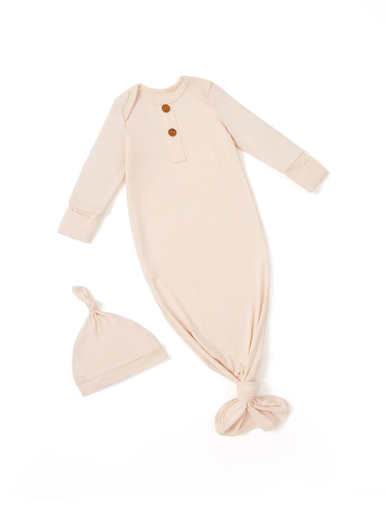 Bamboo infant sleeping gown with matching hat, apricot.