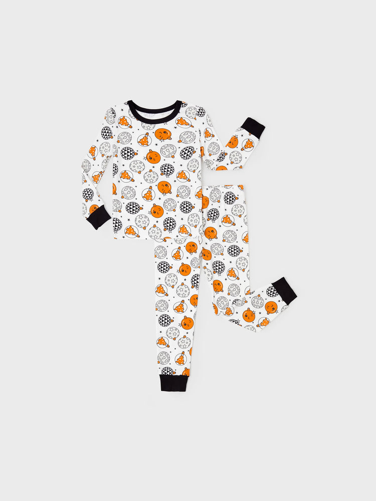 Snug-fitting two-piece bamboo pajamas with childlike Christmas/Halloween print, orange, baby/toddler.