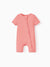 Snug-fitting bamboo baby footed onesie with two-way zipper and anti-slip grips, pink.