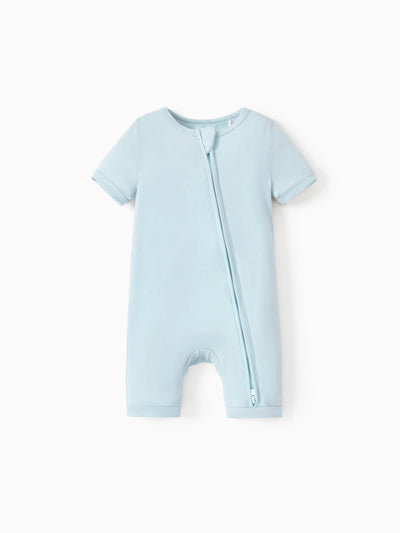Baby snug-fitting bamboo footed onesie with two-way zipper and anti-slip grips, turquoise.