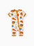 Baby snug-fitting bamboo footed onesie with two-way zipper and anti-slip grips, childlike food pattern, brown.