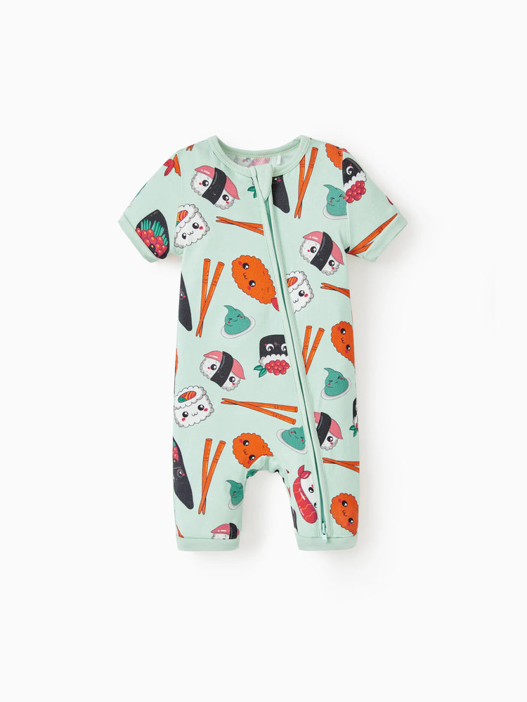 Baby snug-fitting bamboo footed onesie with two-way zipper and anti-slip grips, childlike food pattern, green.