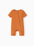 Snug-fitting bamboo baby footed onesie with two-way zipper and anti-slip grips, orange.