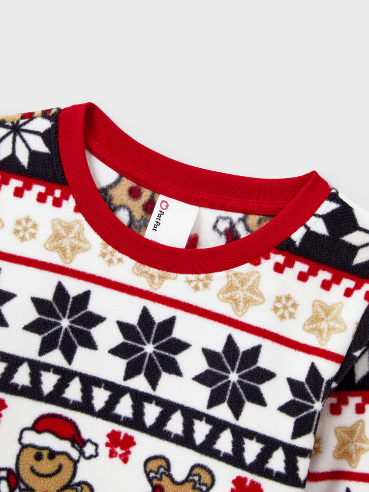 Ensemble pyjama de Noël assorti en polaire pour toute la famille, imprimé pain d'épices et flocons de neige, avec chaussettes de Noël rouges