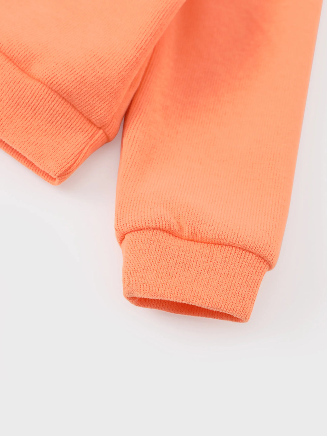 Ensemble Disney Princess Moana pour petite fille, composé d'un haut tricoté et d'une jupe à carreaux orange et rouge.