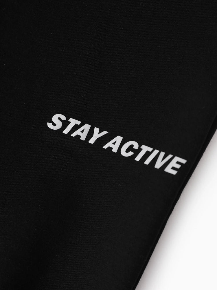 Pantalon de jogging doublé polaire pour enfant avec imprimé réfléchissant et poches – Pantalon de survêtement chaud, respirant et évacuant l'humidité pour garçons et filles, noir