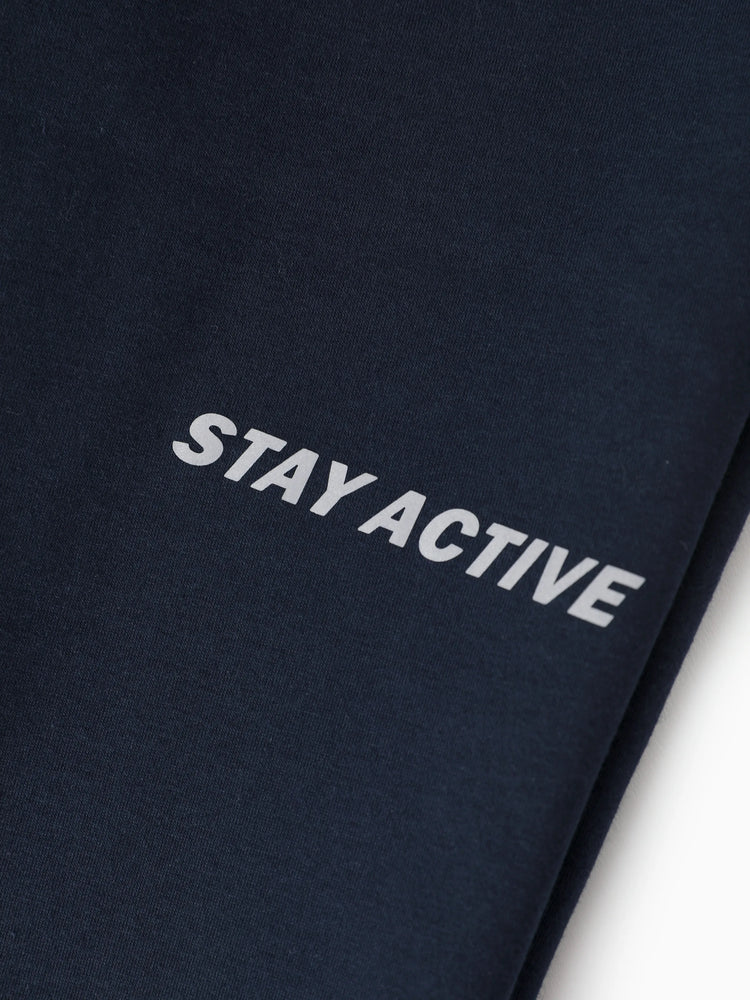 Pantalon de jogging doublé polaire pour enfant avec imprimé réfléchissant et poches – Pantalon de survêtement chaud, respirant et évacuant l'humidité pour garçons et filles, bleu foncé