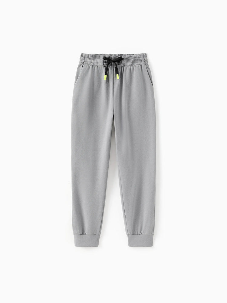 Pantalon de jogging pour enfant avec taille élastique et cordon de serrage – Pantalon de survêtement confortable avec poches pour garçons et filles, gris clair