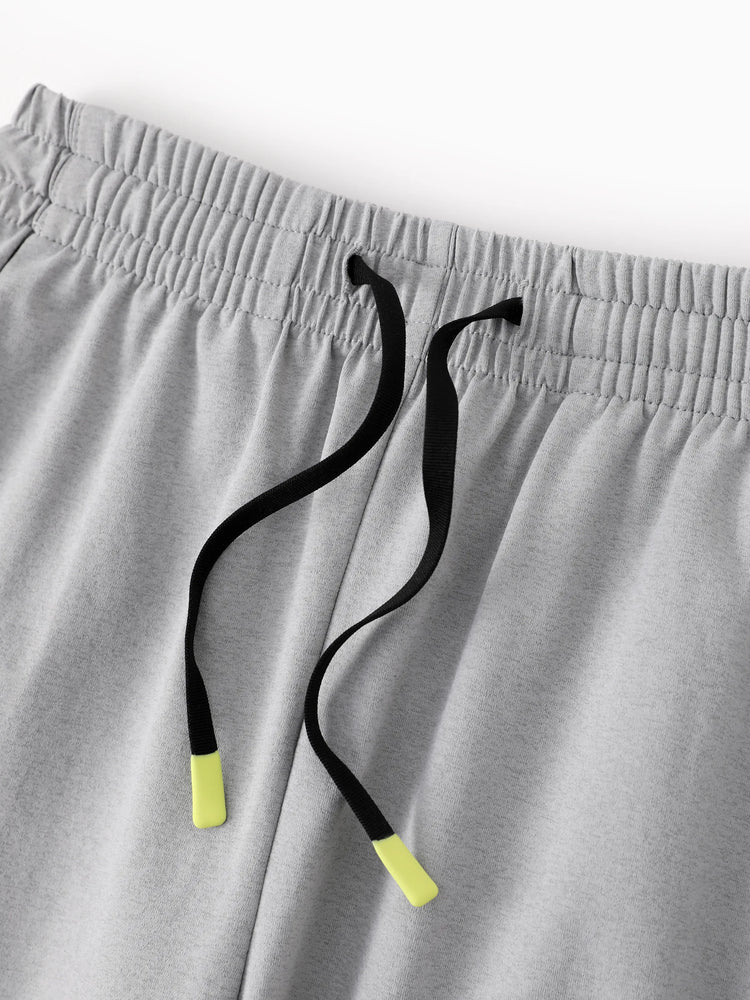 Pantalon de jogging pour enfant avec taille élastique et cordon de serrage – Pantalon de survêtement confortable avec poches pour garçons et filles, gris clair