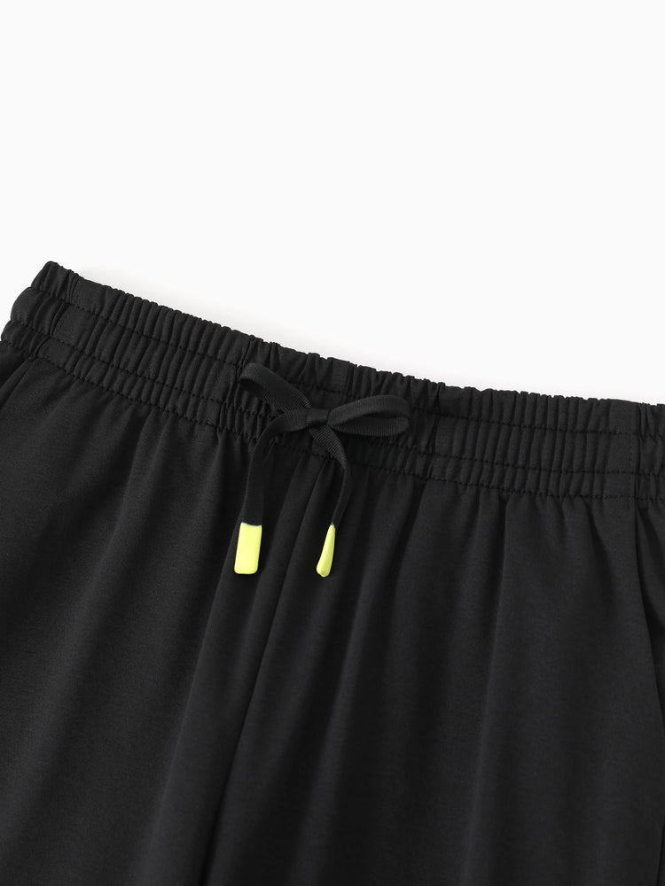 Pantalon de jogging pour enfant avec taille élastique et cordon de serrage – Pantalon de survêtement confortable avec poches pour garçons et filles, noir