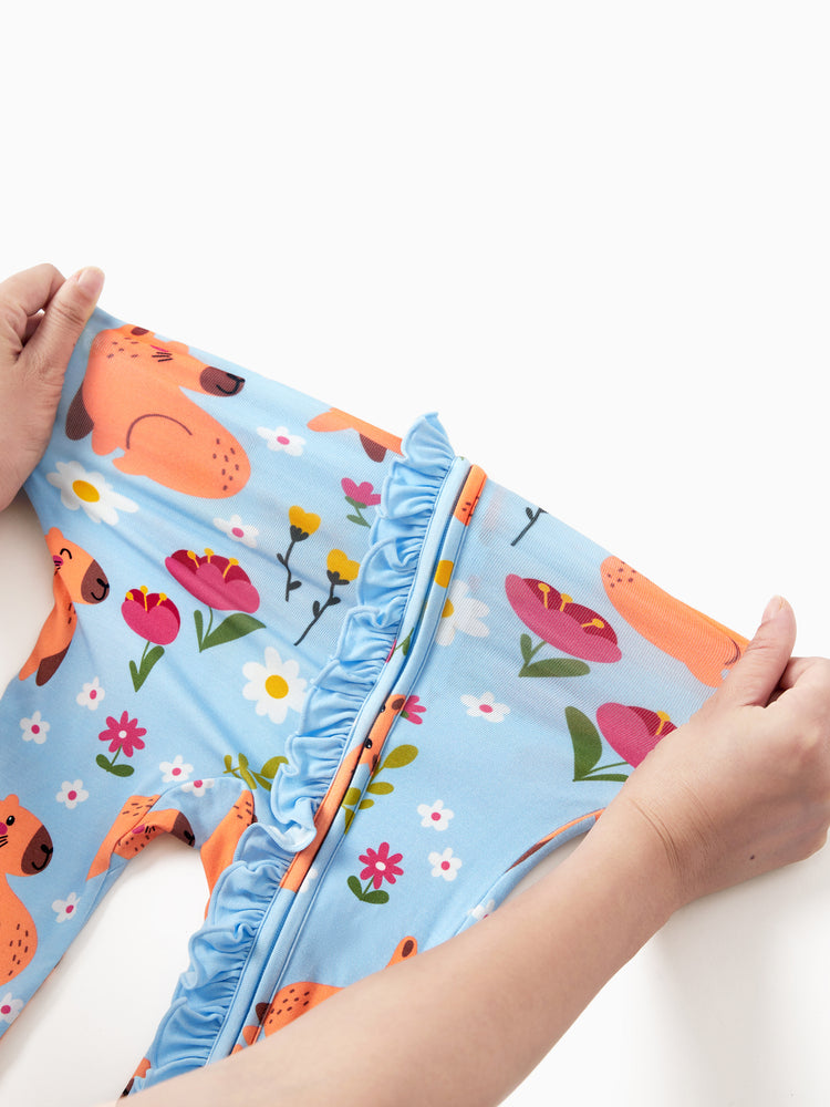 Grenouillère à manches longues et pieds, imprimée animaux, en bambou turquoise, avec fermeture éclair à double sens et bandeau.