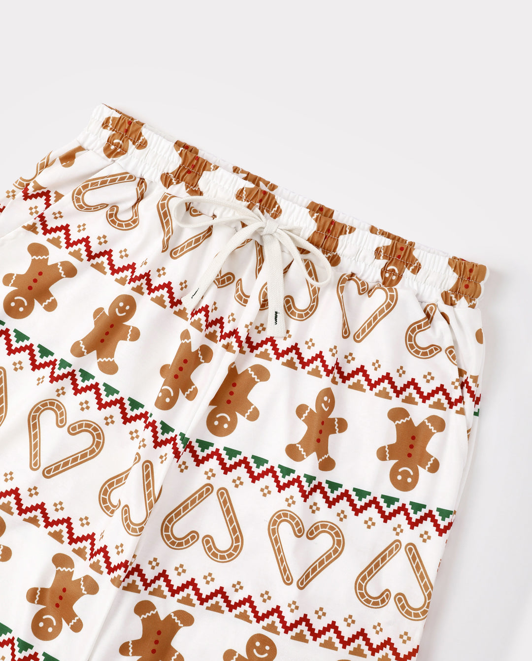 Pijamas navideños a juego para toda la familia con estampado Fair Isle y de muñecos de jengibre