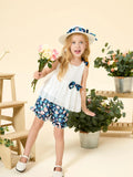 Ensemble 3 pièces pour petite fille avec chapeau décoratif à nœud, débardeur à volants superposés et short à imprimé floral, blanc