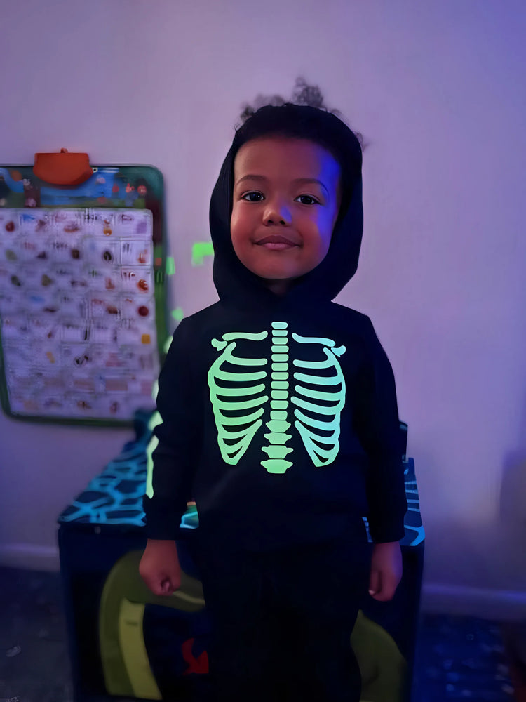 Sweat à capuche à manches longues noir à imprimé squelette phosphorescent pour Halloween, assorti à la famille