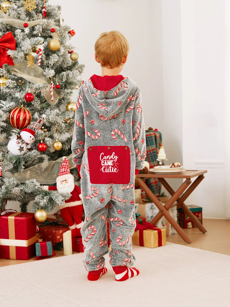 Pyjama grenouillère assorti aux tenues de Noël, motif canne à sucre (brille dans le noir) avec chaussettes de Noël noires