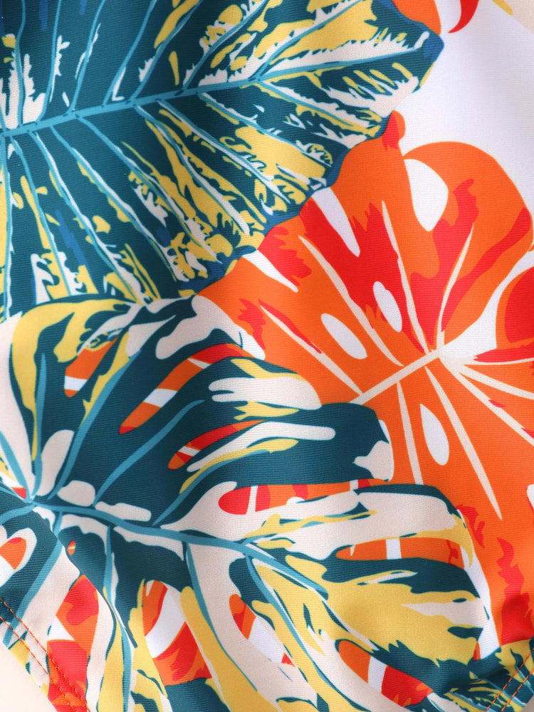 Family Matching Orange and All Over Tropical Plant Print Splicing Ruffle One-Piece Swimsuit and Swim Trunks Shorts Orange color