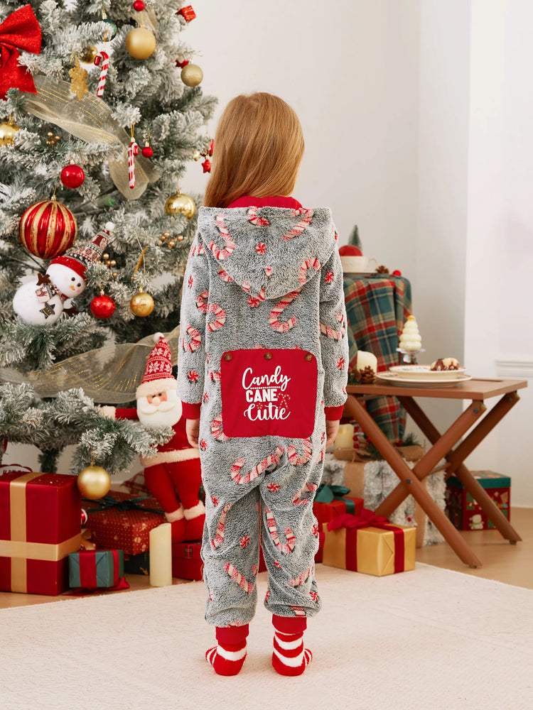 Pyjama grenouillère assorti aux tenues de Noël, motif canne à sucre (brille dans le noir) avec chaussettes de Noël noires