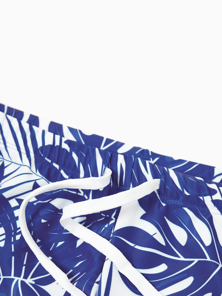 Family Matching Tropical Leaf Print Swim Trunks or Hollow-out Crisscross Straps One-piece Swimsuit Blue