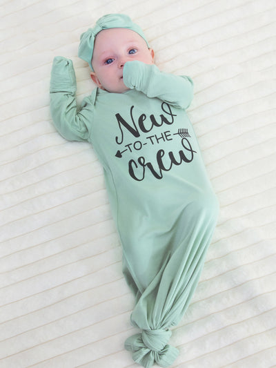 Bamboo infant sleeping gown with matching headband, light green.